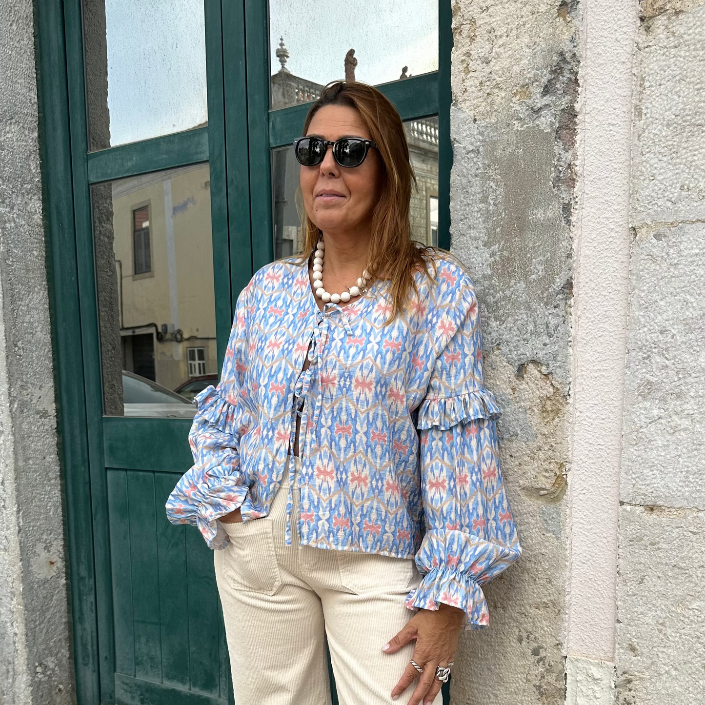 BLUSA COM FECHO DE LAÇOS