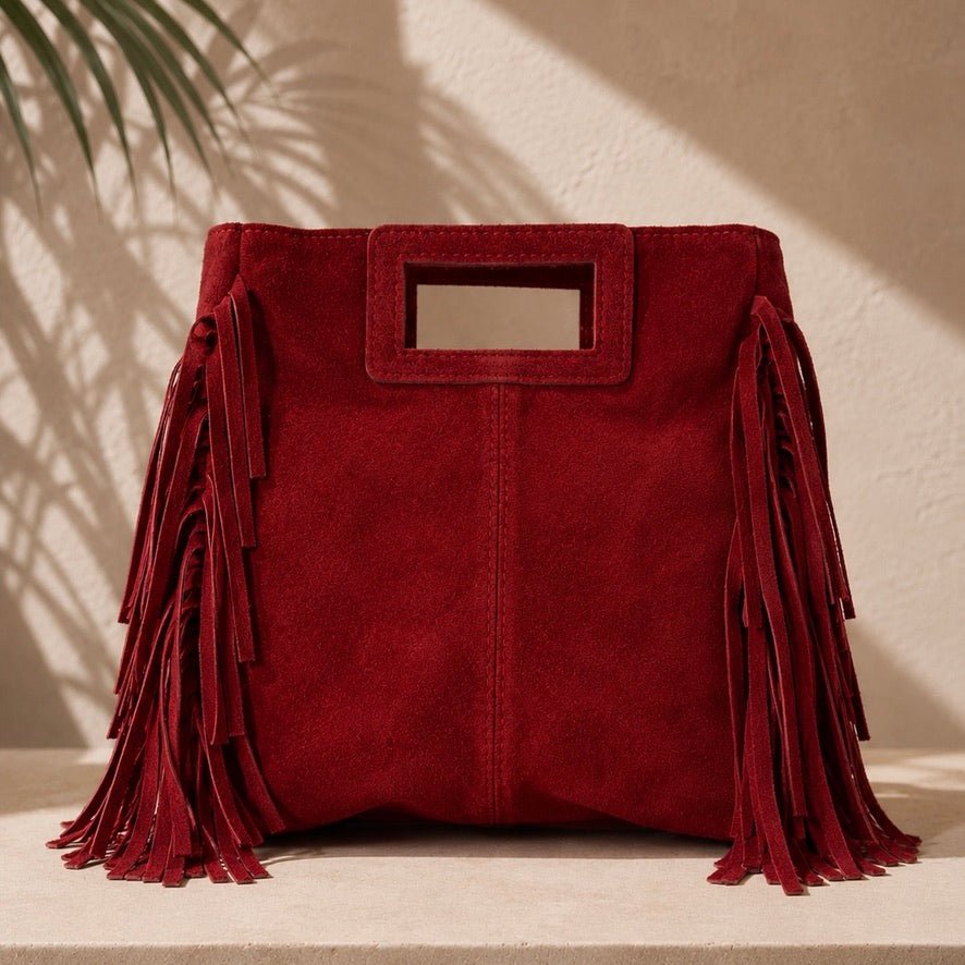 CLUTCH EM CAMURÇA COM FRANJAS - Pé Calçado